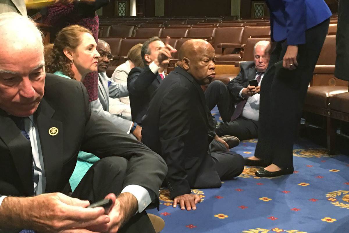 Democrats stage sit-in on House floor to force gun vote